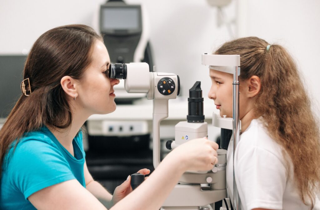 A developmental optometrist performing comprehensive testing on a child's eyes and vision to determine whether they can benefit from vision therapy.